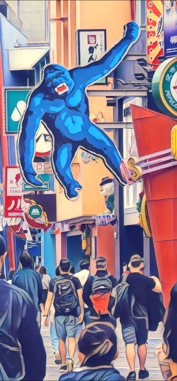 Colorful street scene with a blue gorilla statue and people walking by
